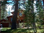 Mammoth Lakes 4 bedroom log home rental located in the Bluffs, sleeps 8 - 10