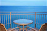 Family beach condo at Emerald Beach Resort. Two bedroom with hallway bunks and living room queen sleeper sofa, sleeps 6 - 8.