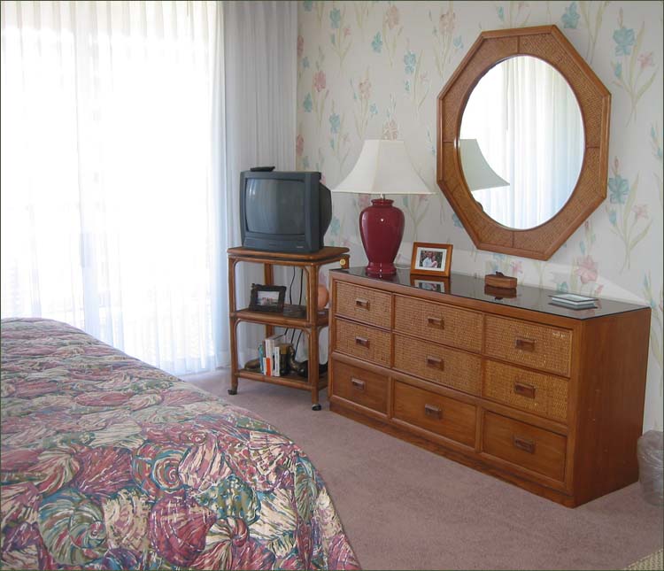 Generous bedroom with king sized bed.