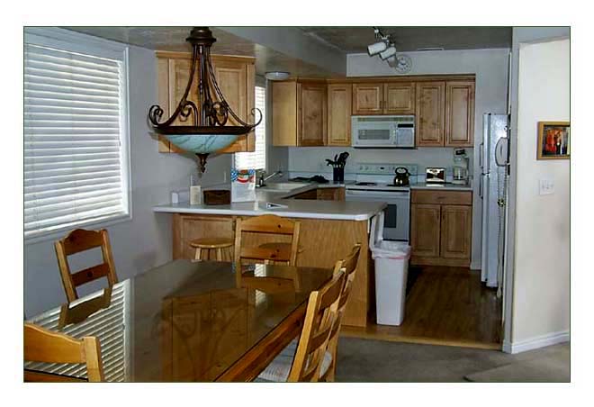 Large fully equipped kitchen with all amenities. 