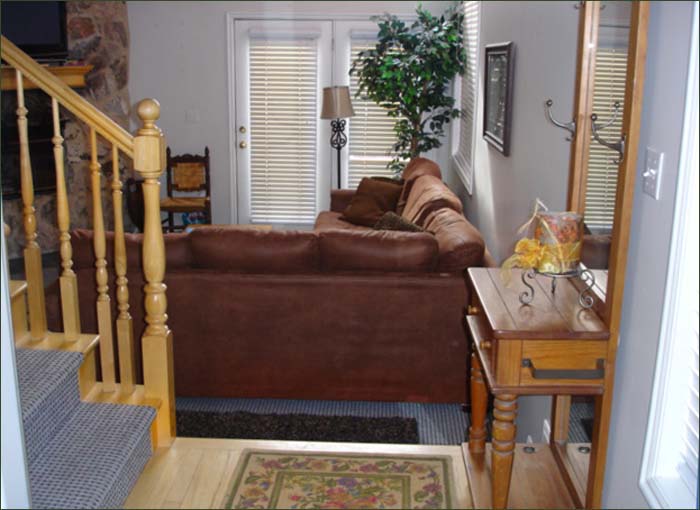 Vacation home features cathedral ceilings and dramatic open loft.