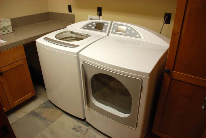 Mammoth luxury lodging features a full sized washer and dryer located next to the mud room and guest rooms on the lower level..
