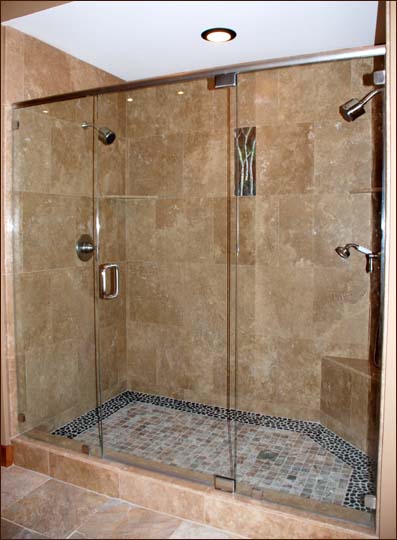 Walk-in master bathroom shower features two shower heads and plenty of space to steam away tired muscles.