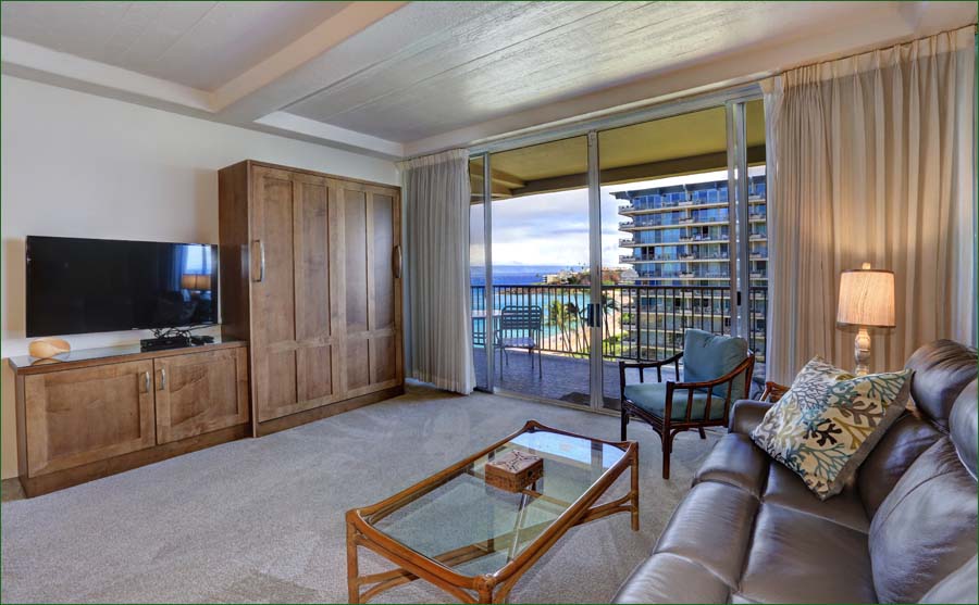 Kitchen overlooks the living area and lanai overlooks the sea!