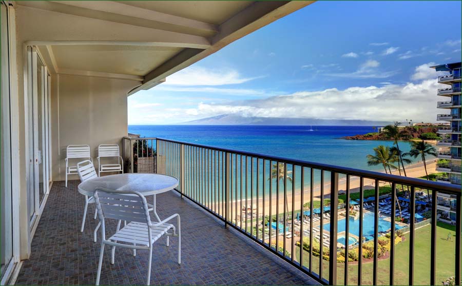 The master bedroom opens to the private balcony overlooking the pool, beach and ocean!