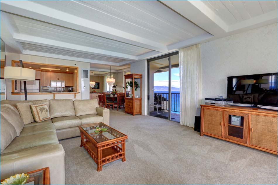 Pacific facing living room with separate dining area and full kitchen.