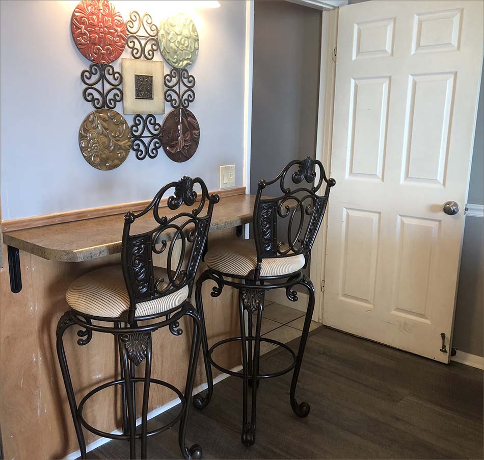 Summit Beach condo features added seating with a breakfast bar